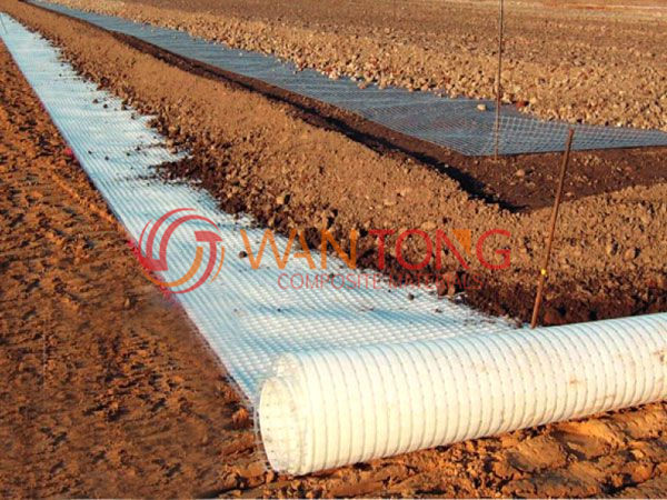 Construction of geogrid composite geotextile