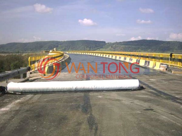 Construction of geogrid composite geotextile